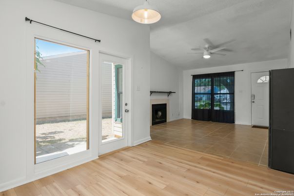 Empty room, Fireplace, Interior, Pendant Lights, Wood Texture Flooring