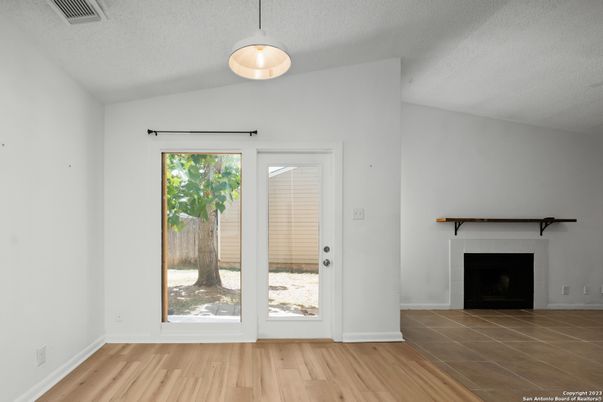Empty room, Fireplace, Interior, Pendant Lights, Wood Texture Flooring