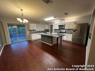 Chandelier, Interior, Kitchen, Stainless Steel Appliances, Wood Texture Flooring