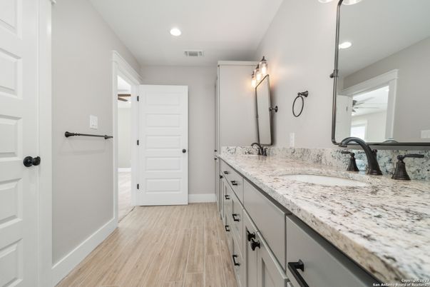 Bathroom, Dual Sink Vanities, Interior, Recessed Lighting, Wood Texture Flooring