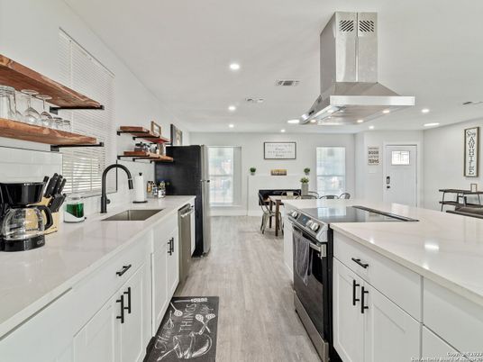 Dining room, Interior, Kitchen, Recessed Lighting, Stainless Steel Appliances, Wood Texture Flooring