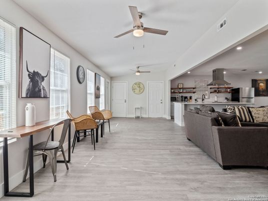 Dining room, Interior, Kitchen, Living room, Recessed Lighting, Stainless Steel Appliances, Wood Texture Flooring
