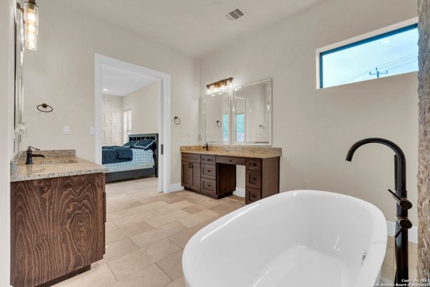 Bathroom, Bedroom, Dual Sink Vanities, Free Standing Baths, Interior, Recessed Lighting