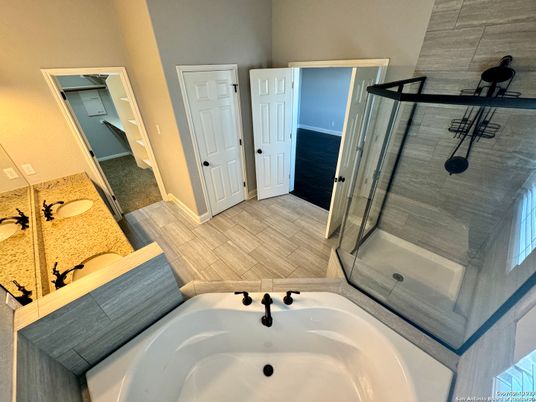 Bathroom, Dual Sink Vanities, Glass Shower, Interior, Wood Texture Flooring