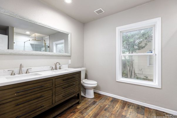 Bathroom, Dual Sink Vanities, Interior, Recessed Lighting, Wood Texture Flooring