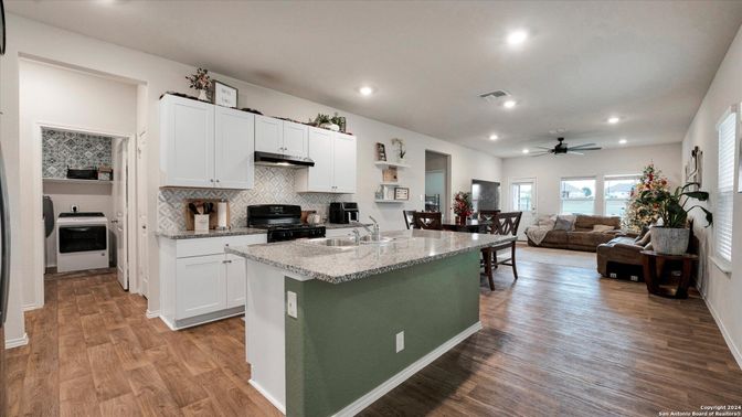 Dining room, Interior, Kitchen, Living room, Recessed Lighting, Wood Texture Flooring