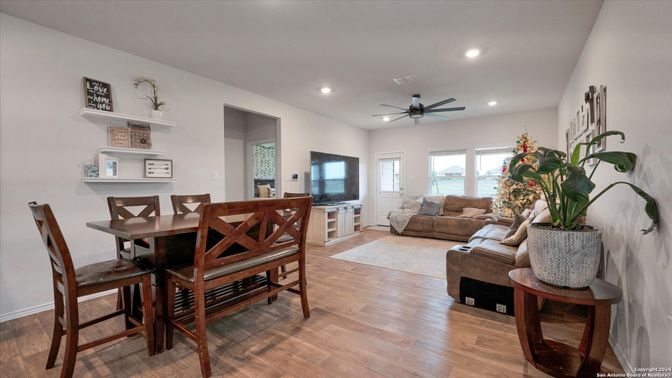 Dining room, Fireplace, Interior, Living room, Recessed Lighting, Wood Texture Flooring