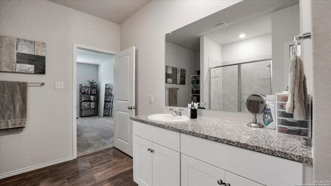 Bathroom, Dual Sink Vanities, Interior, Recessed Lighting, Wood Texture Flooring