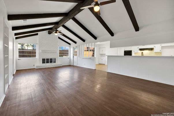 Empty room, Fireplace, Interior, Kitchen, Pendant Lights, Wooden Beams, Wood Texture Flooring
