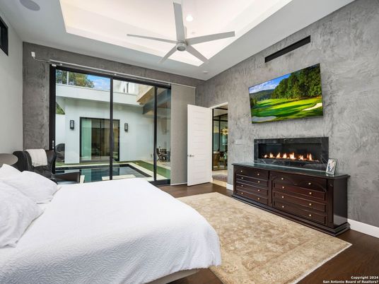 Bedroom, Fireplace, Interior, Recessed Lighting, Wood Texture Flooring