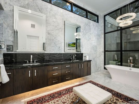 Bathroom, Dual Sink Vanities, Free Standing Baths, Interior, Marble Walls, Pendant Lights