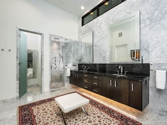 Bathroom, Dual Sink Vanities, Glass Shower, Interior, Marble, Marble Walls, Recessed Lighting