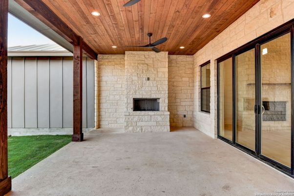 Empty room, Exterior, Fireplace, Recessed Lighting, Stone Walls