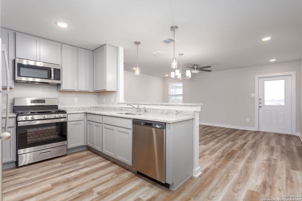 Interior, Kitchen, Pendant Lights, Recessed Lighting, Stainless Steel Appliances, Wood Texture Flooring