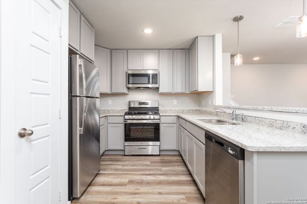 Interior, Kitchen, Pendant Lights, Recessed Lighting, Stainless Steel Appliances, Wood Texture Flooring