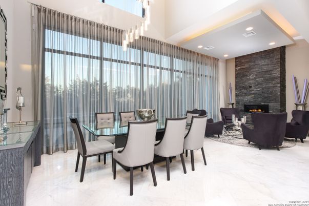 Dining room, Fireplace, Interior, Living room, Marble, Pendant Lights, Recessed Lighting, Stone Walls