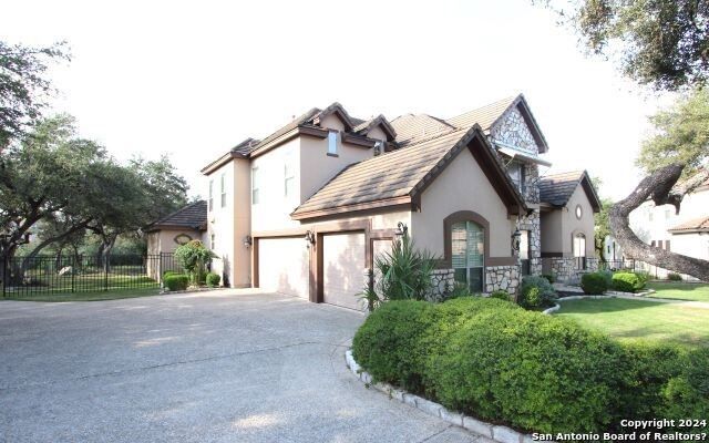 Attached, Backyard, Exterior, Facade, Tudor Revival