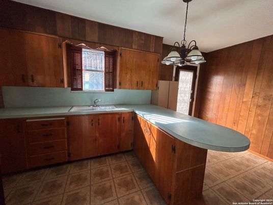 Interior, Kitchen, Pendant Lights, Tile Countertops, Wooden Walls