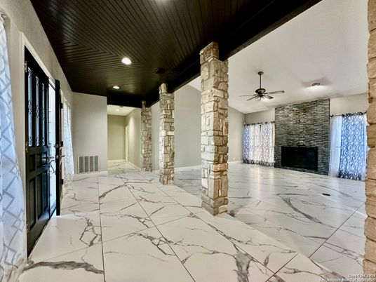 Empty room, Fireplace, Interior, Marble, Recessed Lighting, Stone Walls