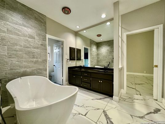 Bathroom, Dual Sink Vanities, Free Standing Baths, Interior, Marble, Recessed Lighting