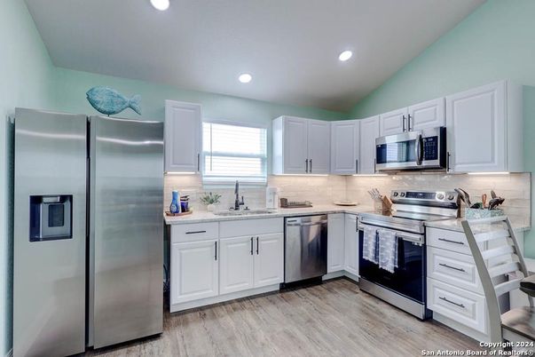 Interior, Kitchen, Recessed Lighting, Stainless Steel Appliances, Wood Texture Flooring