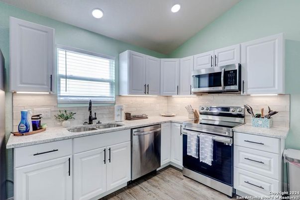 Interior, Kitchen, Recessed Lighting, Stainless Steel Appliances, Wood Texture Flooring