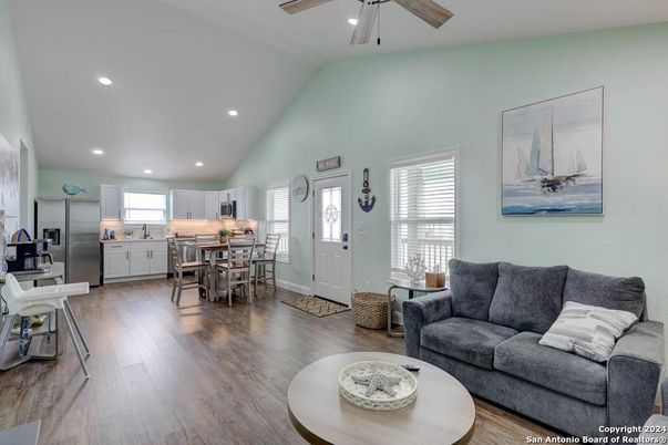 Dining room, Interior, Kitchen, Living room, Recessed Lighting, Stainless Steel Appliances, Wood Texture Flooring