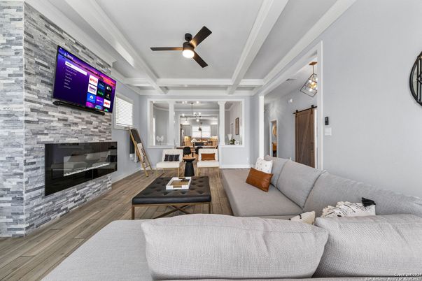 Dining room, Fireplace, Interior, Living room, Pendant Lights, Stone Walls, Wood Texture Flooring