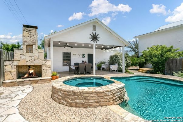 Exterior, Fireplace, Pool