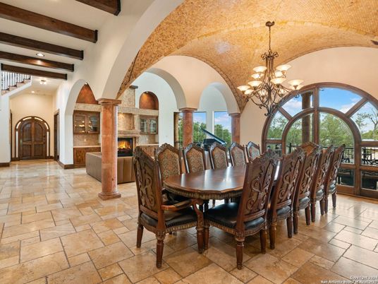 Chandelier, Dining room, Fireplace, Interior, Recessed Lighting, Wooden Beams