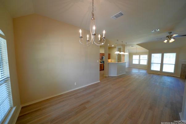 Chandelier, Empty room, Interior, Kitchen, Pendant Lights, Recessed Lighting, Wood Texture Flooring