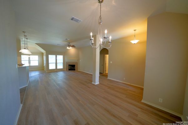 Empty room, Fireplace, Interior, Pendant Lights, Wood Texture Flooring