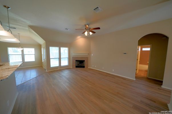 Empty room, Fireplace, Interior, Pendant Lights, Wood Texture Flooring