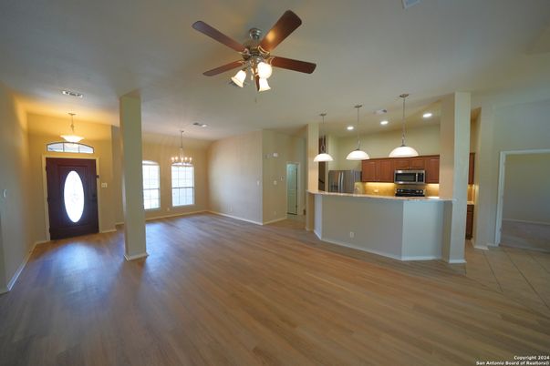 Chandelier, Interior, Kitchen, Pendant Lights, Recessed Lighting, Stainless Steel Appliances, Wood Texture Flooring