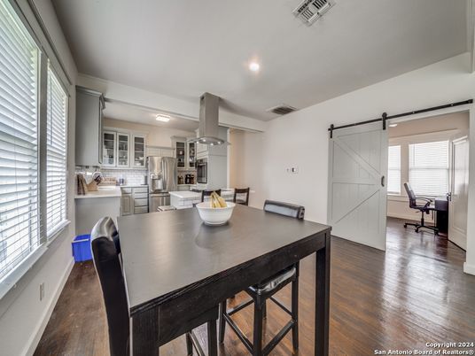Dining room, Interior, Kitchen, Recessed Lighting, Stainless Steel Appliances, Wood Texture Flooring