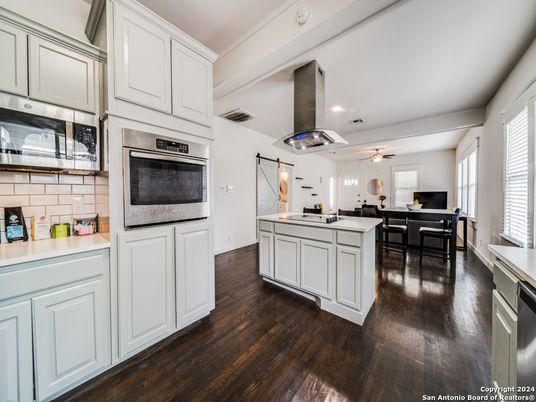 Dining room, Interior, Kitchen, Recessed Lighting, Stainless Steel Appliances, Wood Texture Flooring