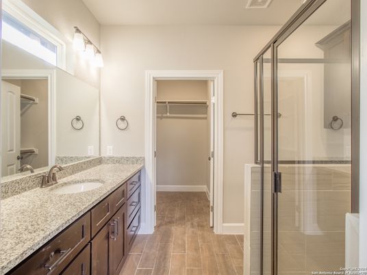 Bathroom, Dual Sink Vanities, Glass Shower, Interior, Walk-in Closets, Wood Texture Flooring