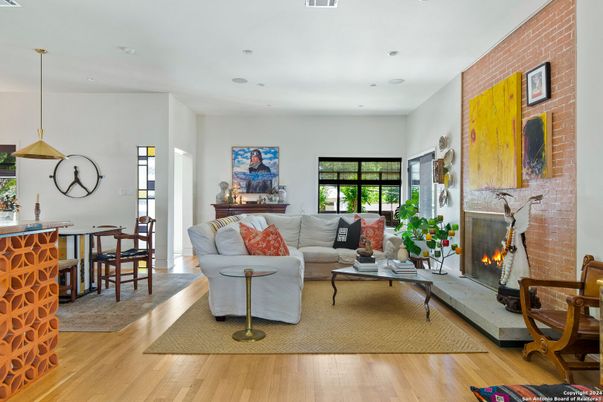 Fireplace, Interior, Living room, Pendant Lights, Recessed Lighting, Stone Walls, Wood Texture Flooring