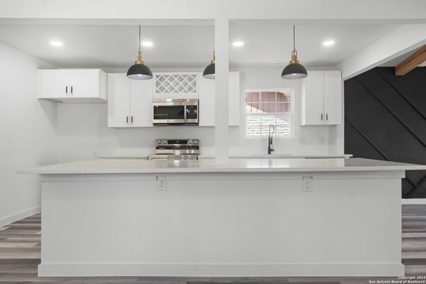 Interior, Kitchen, Pendant Lights, Recessed Lighting, Stainless Steel Appliances, Wood Texture Flooring