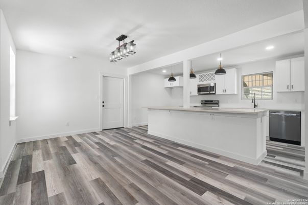 Interior, Kitchen, Pendant Lights, Recessed Lighting, Stainless Steel Appliances, Wood Texture Flooring