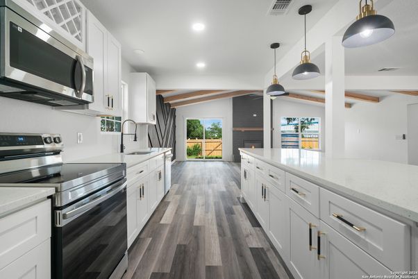 Interior, Kitchen, Pendant Lights, Recessed Lighting, Stainless Steel Appliances, Wood Texture Flooring
