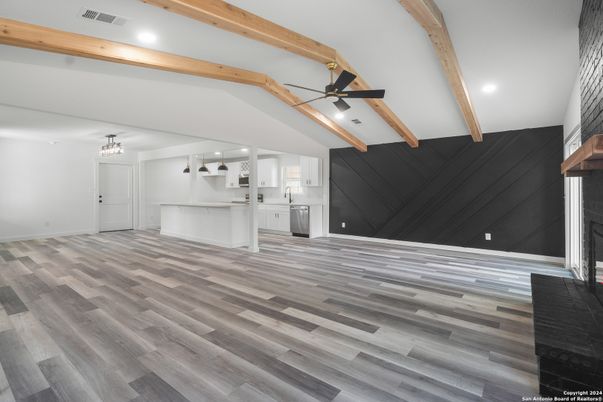 Empty room, Fireplace, Interior, Kitchen, Recessed Lighting, Wooden Beams, Wood Texture Flooring