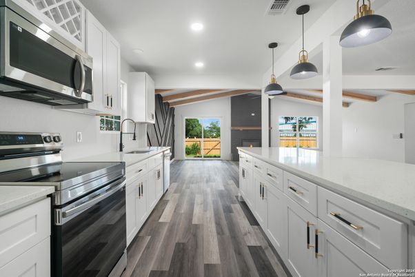 Interior, Kitchen, Pendant Lights, Recessed Lighting, Stainless Steel Appliances, Wood Texture Flooring