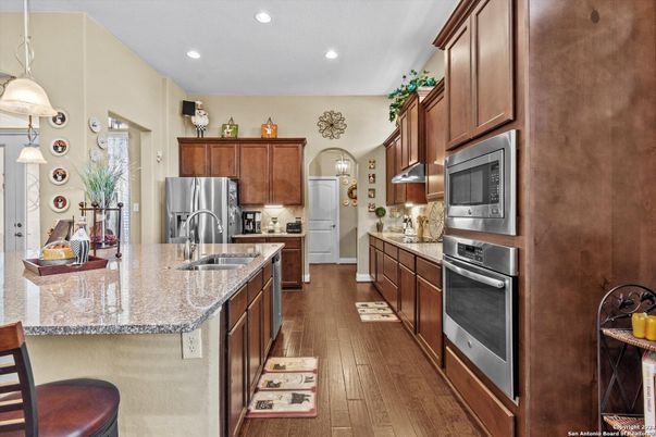Interior, Kitchen, Pendant Lights, Recessed Lighting, Stainless Steel Appliances, Wood Texture Flooring