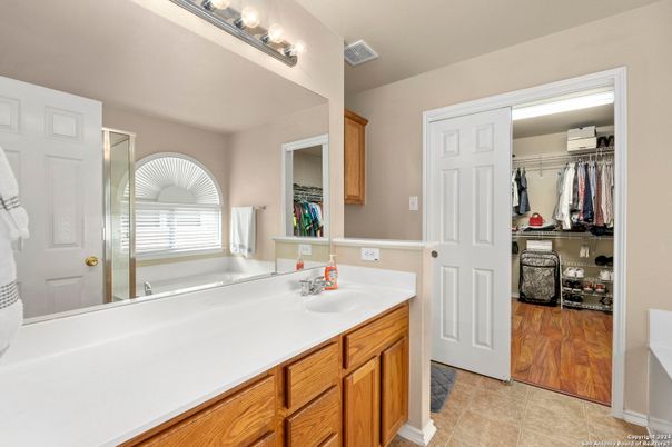Bathroom, Dual Sink Vanities, Interior, Walk-in Closets, Wood Texture Flooring