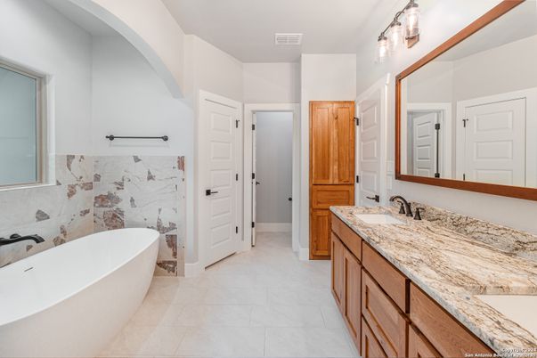 Bathroom, Dual Sink Vanities, Free Standing Baths, Interior, Marble Walls
