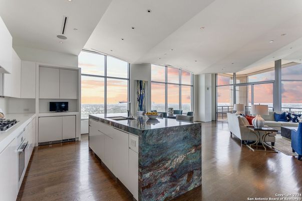 Dining room, Interior, Kitchen, Living room, Recessed Lighting, Stainless Steel Appliances, Wood Texture Flooring
