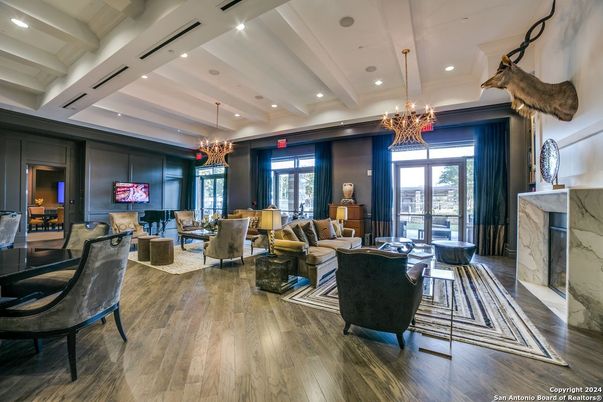 Chandelier, Dining room, Fireplace, Interior, Living room, Recessed Lighting, Wood Texture Flooring
