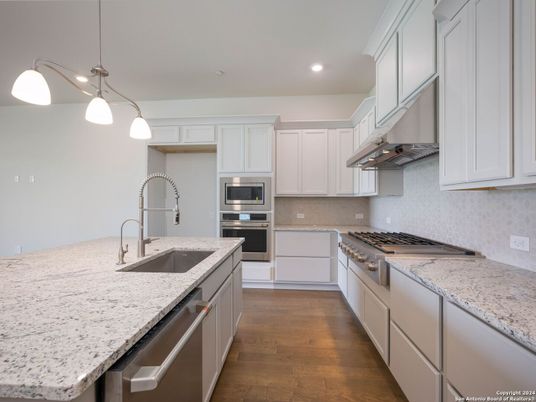 Interior, Kitchen, Pendant Lights, Recessed Lighting, Stainless Steel Appliances, Wood Texture Flooring