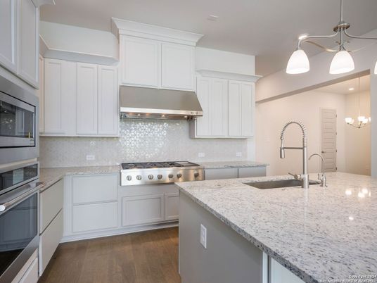 Chandelier, Interior, Kitchen, Pendant Lights, Recessed Lighting, Stainless Steel Appliances, Wood Texture Flooring